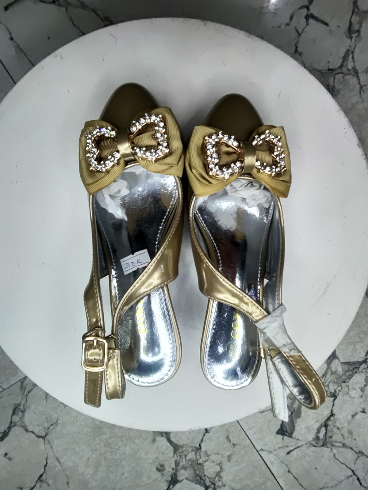 Wedged Gold shoe